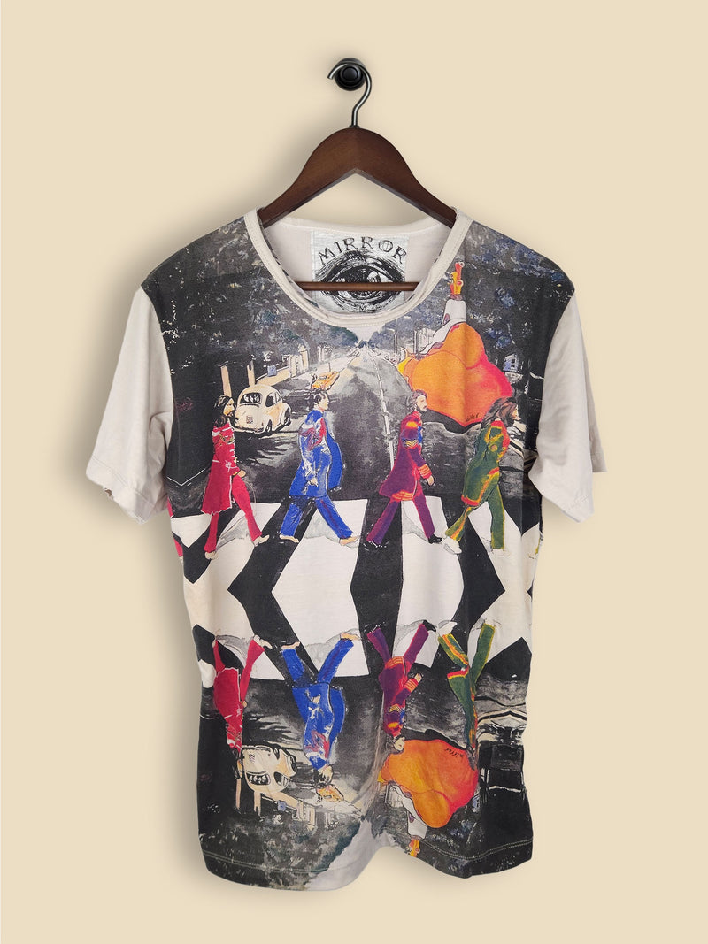 A light grey  T-shirt featuring a colorful, artistic reinterpretation of the iconic Abbey Road album cover by The Beatles.
