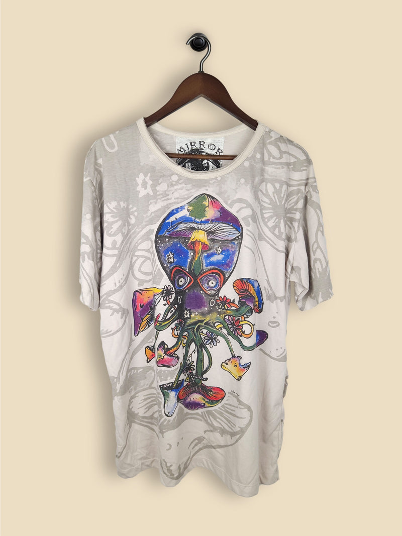 A light grey  t-shirt featuring a bold design of an octopus, festooned with colorful mushrooms.