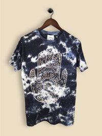 A Navy and white tie dye t-shirt featuring a print of a hamsa hand with geometric patterning