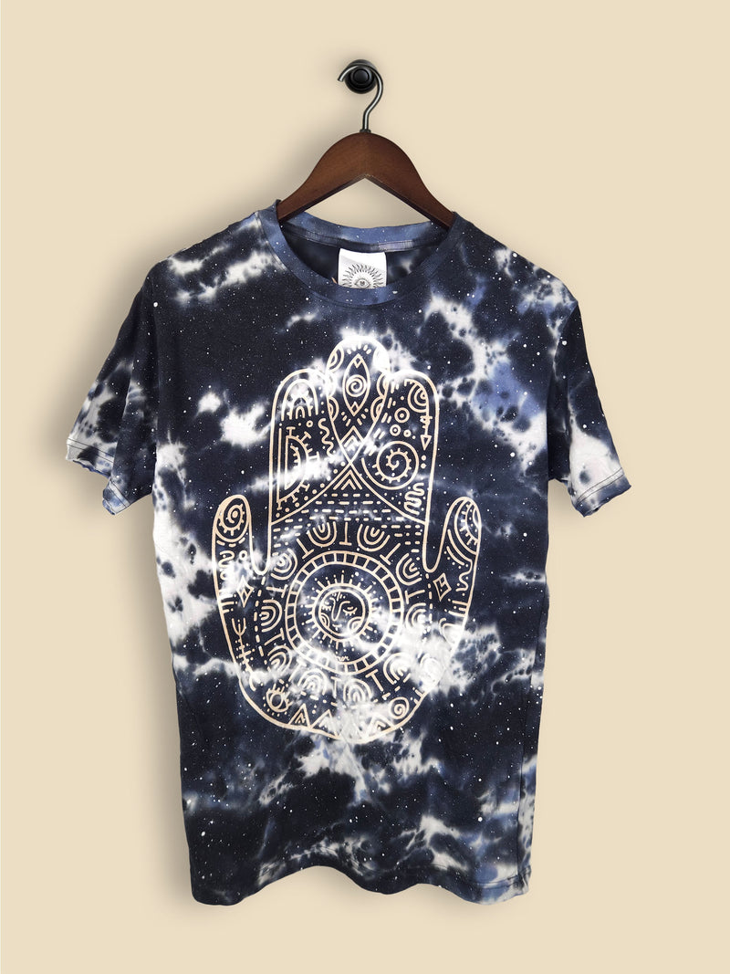 A Navy and white tie dye t-shirt featuring a print of a hamsa hand with geometric patterning