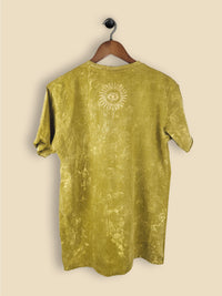 A khaki t-shirt featuring a print of a hamsa hand with geometric patterning
