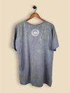 Slate Green T-shirt featuring a celestial design of a serene sun merging into a crescent moon with mandala details and star motifs