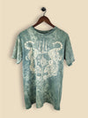 Sea green t-shirt with a mirrored white tiger graphic and abstract tribal symbols