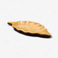 Wooden leaf-shaped tray on a white background