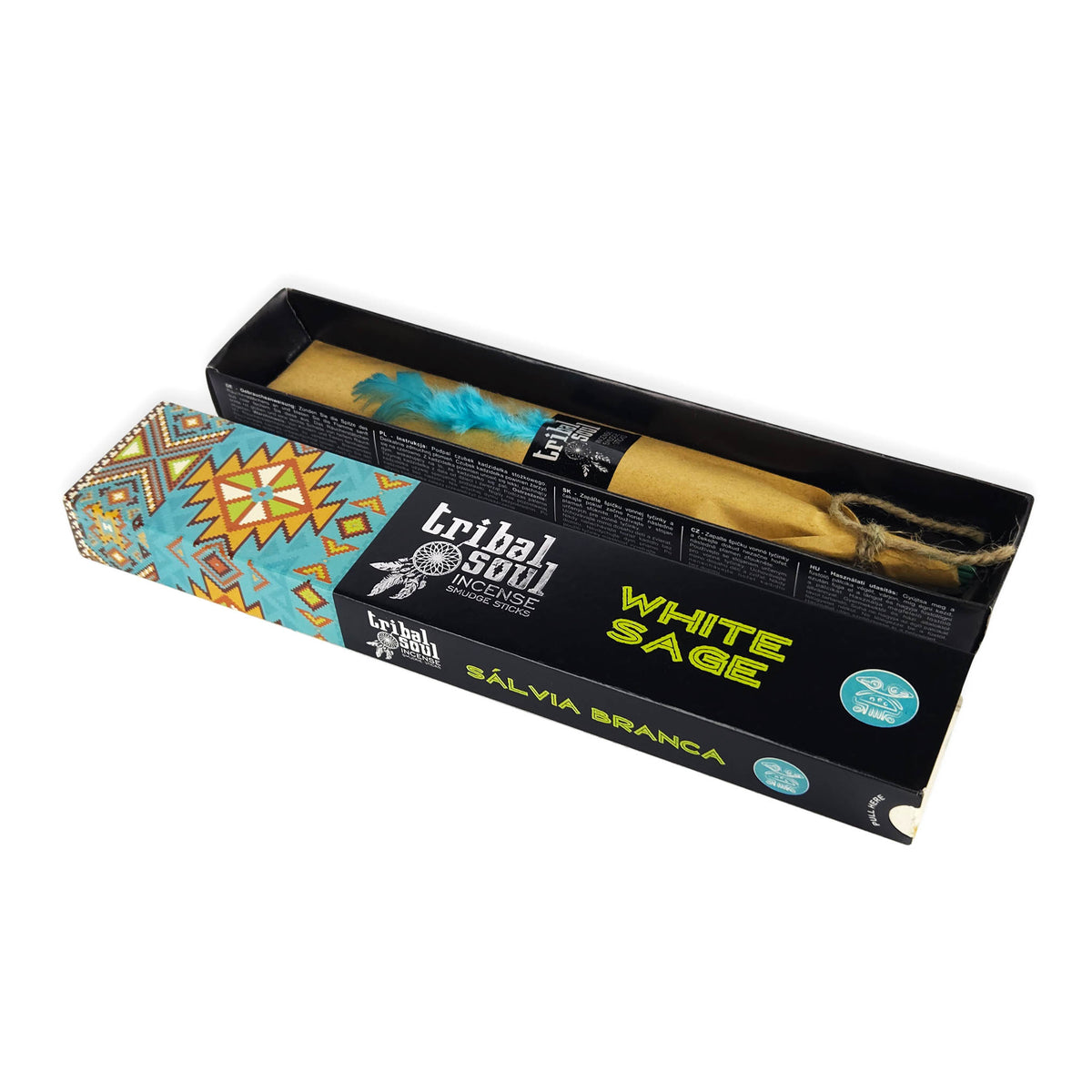 A box of Tribal Soul incense labelled 'White Sage' and 'Sálvia Branca.' The box features a colorful geometric pattern on one end and contains a bundle wrapped in brown paper with a blue feather attached. This image highlights the unique packaging and presentation of the incense, appealing to those interested in aromatherapy and cultural products.