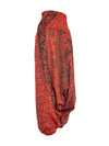 Side shot of red drop crotch pants with floral and elephant print