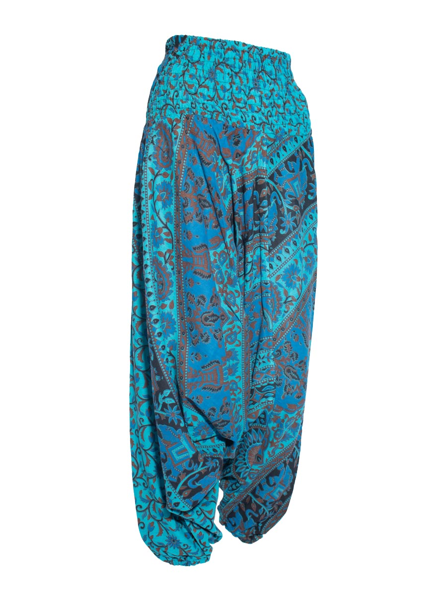 Side shot of blue drop crotch pants with floral and elephant print