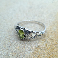 Side shot of 925 Sterling Silver Faceted Fern Leaf Peridot Ring